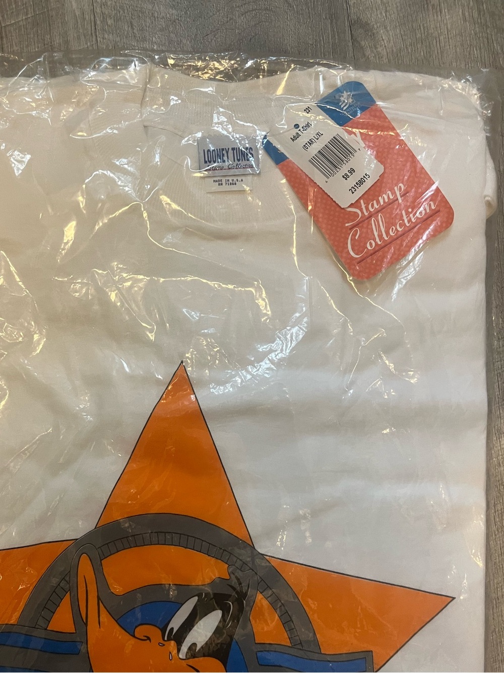 Vintage 90s Looney Tunes Daffy Duck White Graphic Tee - Orange & Blue Star